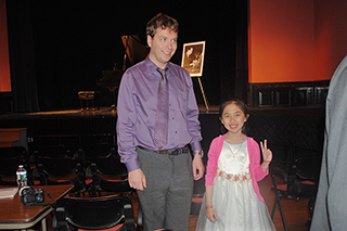 Photo Gallery of YM Piano Studio in Central New Jersey, East Windsor. JENNIFER LIU with her piano teacher YEVGENY MOROZOV, East Windsor.