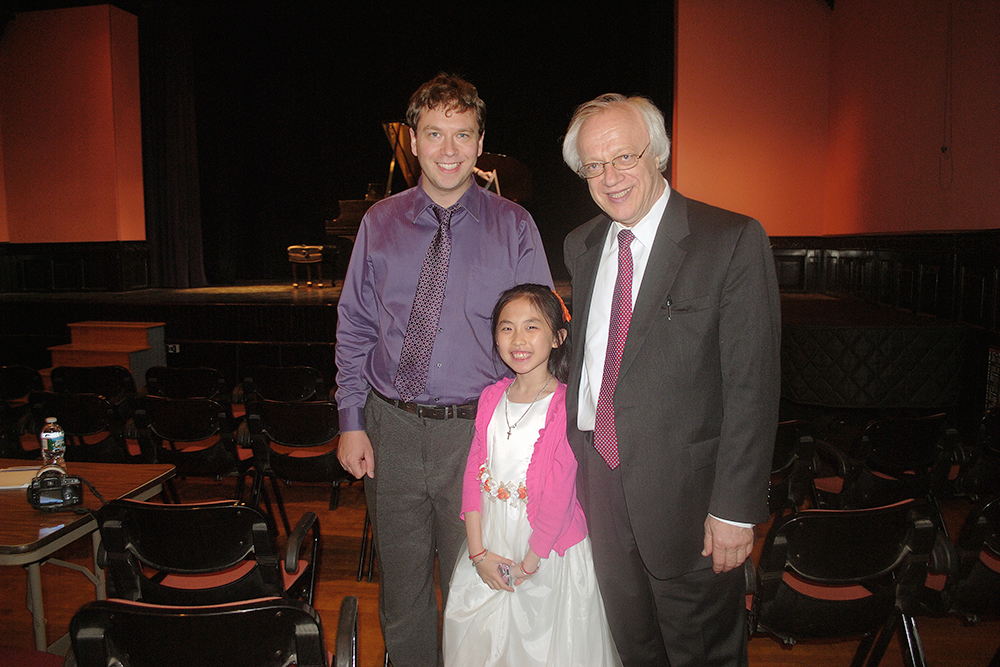 Photo Gallery of YM Piano Studio. First Prize winner JENNIFER LIU with her piano teacher YEVGENY MOROZOV and piano jury member SERGEI POLUSMIAK.